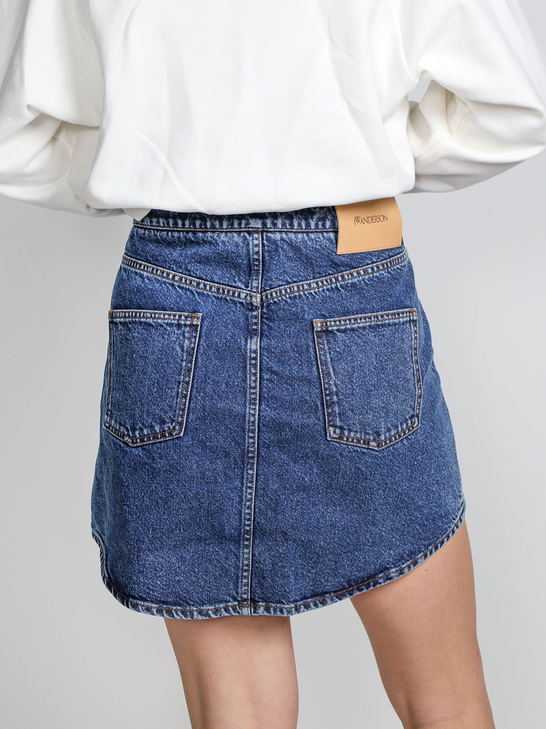 JW Anderson Denim mini skirt with patch pockets  blue 34